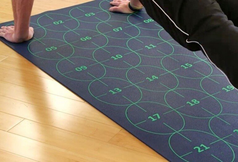 Man using Yoga by Numbers Mat
